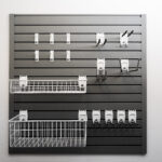 flexipanel garage storage starter set with hook and basket attachements